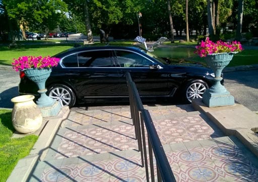 private black sedan BMW 740